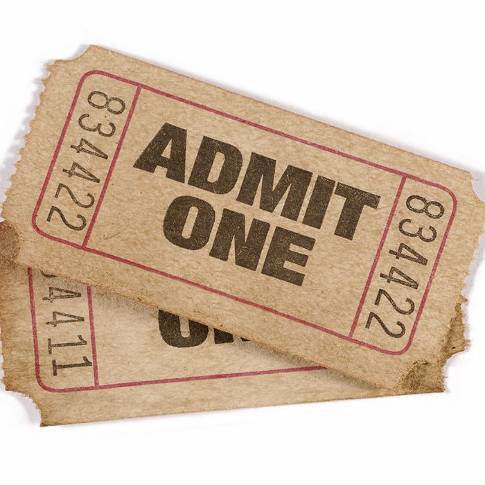 Old worn admission tickets