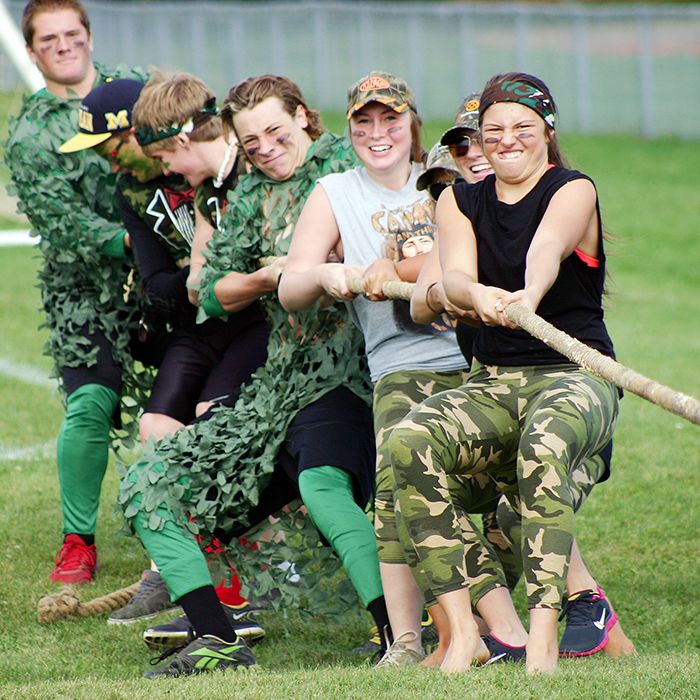 Emily Uher, right, leads her team from Blenheim District High School at the tug-of-war event of the Animal House House Olympics on Saturday during Red Feather at Chatham-Kent Secondary School.