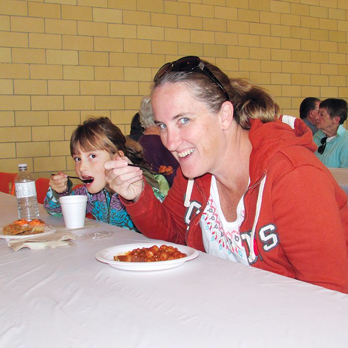 Cindy Smith and mother Sharon Smith enjoy the chili, wieners and beans dishes at Chatham-Kent Financial Advisors 38th annual Poor Boy Luncheon Oct. 25 at St. Joe’s Hall in Chatham.