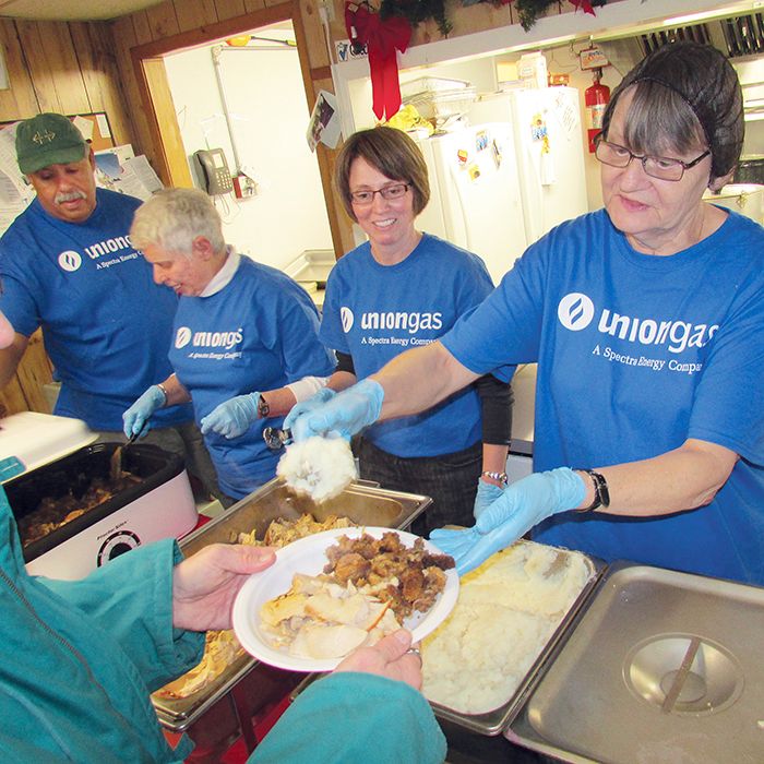 From left, Terry Shadd, Marlene Patterson, Jennifer Broeders and Cathy Konecny were among the Union Gas and regular Campbell AME soup kitchen volunteers on hand Wednesday serving up a Christmas dinner, turkey and all the trimmings.