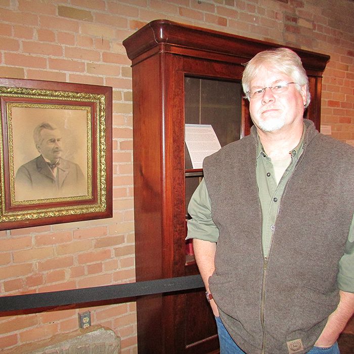 Dave Benson, guest curator of the Collecting Stories exhibit currently on display at the Chatham-Kent Museum, relates his story behind finding the portrait and bookcase of David Mills of Palmyra. Mills was an MP representing Bothwell in Canada’s first parliament in 1867, a Senator and a Supreme Court Justice. Searching through a packed Mills family homestead, Benson managed to find and restore these items on display.