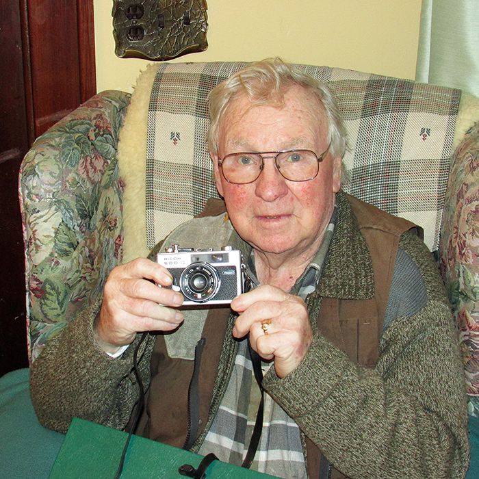 Pat Kevany shows the Ricoh 500 camera he took with him in 1978 on a cross-Canada tour the Irish immigrant took to get to know the country.
