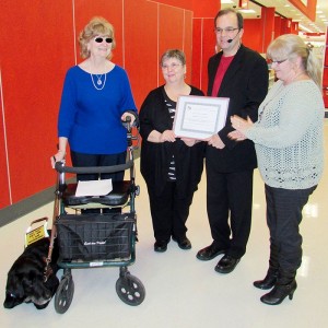 From left, Chatham-Kent Accessibility Advisory Committee member Mickey Puddicomb, Michelle Schryer, committee chairman Ralph Roels and Chatham Coun. Marjorie Crew.