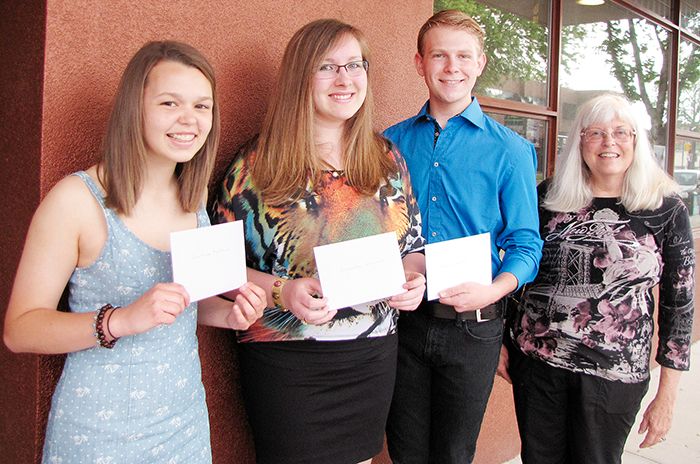Future film students Courtney McAlorum, Samantha Ainsworth and Monty Langford were thrilled to receive scholarships from Connie Badour (far right), secretary of the Chatham-Kent Film Group. The group awarded each student a $1,000 scholarship for their film studies. The cheques were presented June 2 at the Capitol Theatre in Chatham.