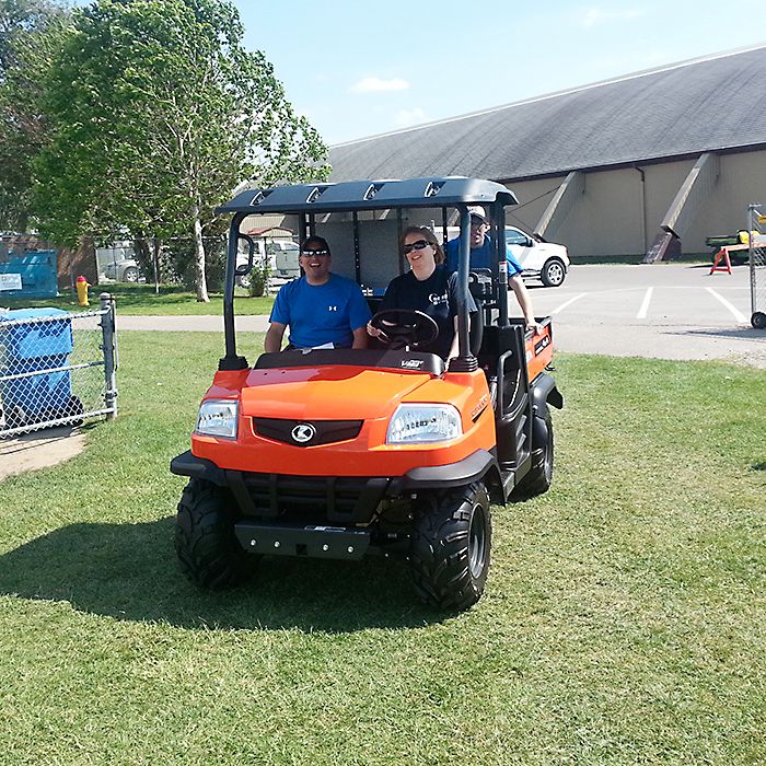 Logistics co-chair Christina Payne shuttled food co-chair Louie Jeromel and some of his supplies to the Food Tent Friday afternoon prior to Relay For Life.