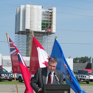 Tom Kissner, general manager of the Chatham-Kent PUC, addresses the media as the new exterior paint job on the Chatham water tower is unveiled July 31. The 20-year-old tower had a $2.1-million makeover inside and out, with an upgrade to safety systems as part of the mix.