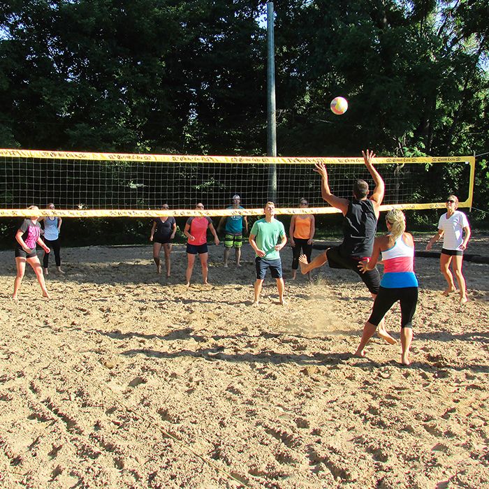 Teams enjoy a friendly game of beach volleyball at Chatham’s Portuguese Canadian Club. Thanks to the hard work of volunteers, the club offers two nights of volleyball a week, and has a patio area overlooking the action.