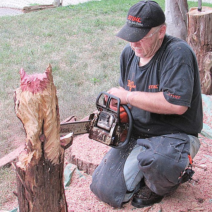Rondeau wood carver and chainsaw sculptor Paul Danielski spent the day working on a piece of juniper wood behind the Erieau Fire Hall during Art on the Boulevard.