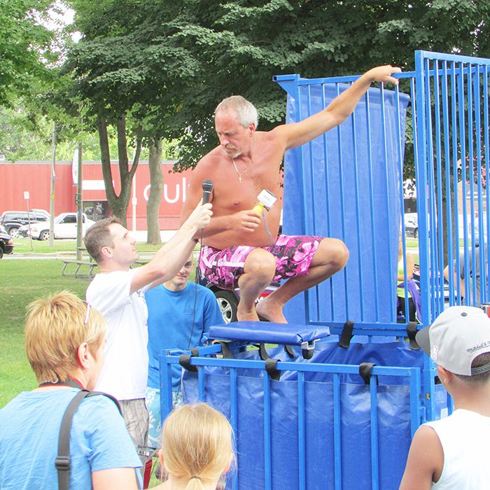 Randy Hope prepares for a very chilling dunking into a tank of ice water Sunday in Tecumseh Park.