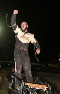 Kyle Patrick pumps his fist as he exits his winning OTS wingless sprint. (James MacDonald, Apex One Photo)