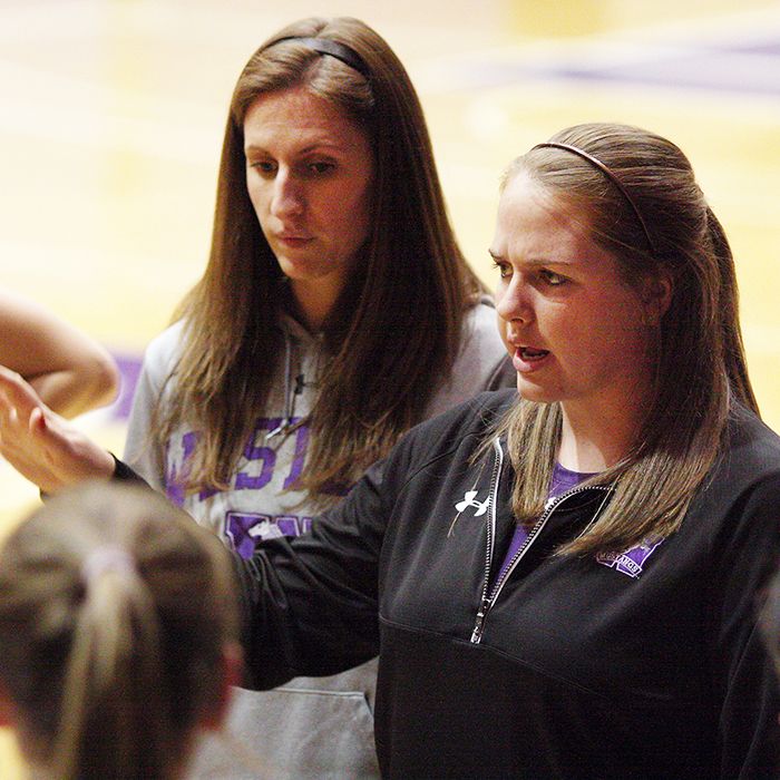 Melissa Bartlett, right, coaches the Western University Mustangs women's volleyball team, with assistant coach Melissa Mann looking on. (Photo by Grace Chung/ Mustangs Athletics)