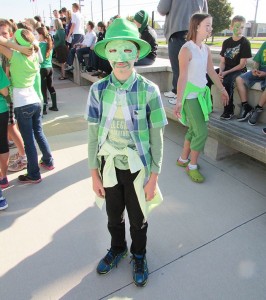 Tyler Branquet of St. Philippe School shows off his spirit at Franco-Ontarian Flag Day Thursday outside the John D. Bradley Convention Centre.