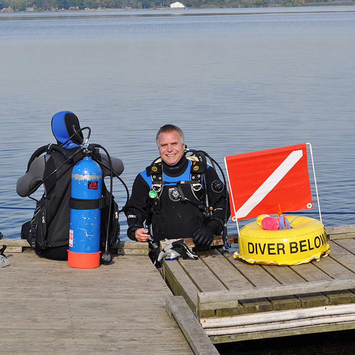 Members of the Red Devil Scuba club prepare to scour Rondeau Bay as part of the fourth annual Great Canadian Shoreline Cleanup. The divers, and the Union Gas Helping Hands volunteers, picked up nearly 1,600 pounds of trash from the Lake Erie shoreline of Rondeau Provincial Park and waters of Rondeau Bay recently. (Contributed image)