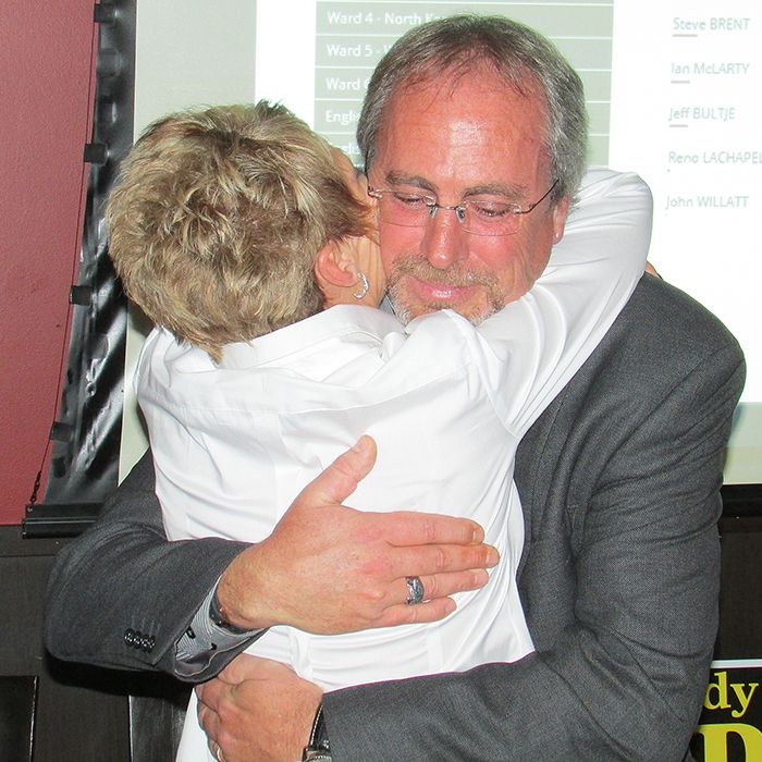 Randy hope hugs his wife, Diane, in celebration of being re-elected mayor of Chatham-Kent Monday.