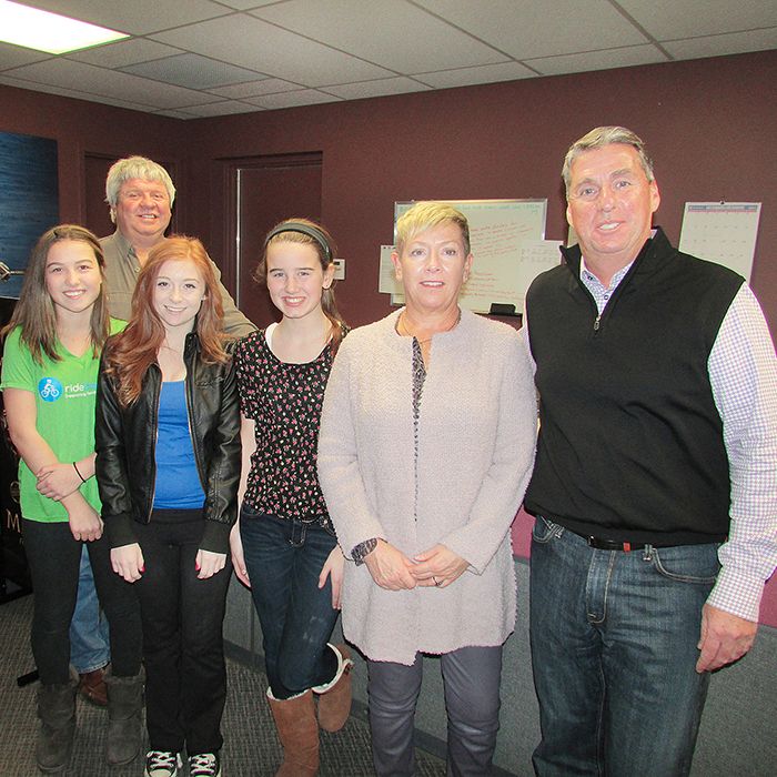 From left, Respect Revolution performers Mackenzie French, Alyssa Doherty and Hannah Teetzel, along with Mike Neuts of Make Children Better Now, are shown with Robin and Bob Hockney of BBR Logistics, which donated $5,000 to help deliver the anti-bully message.