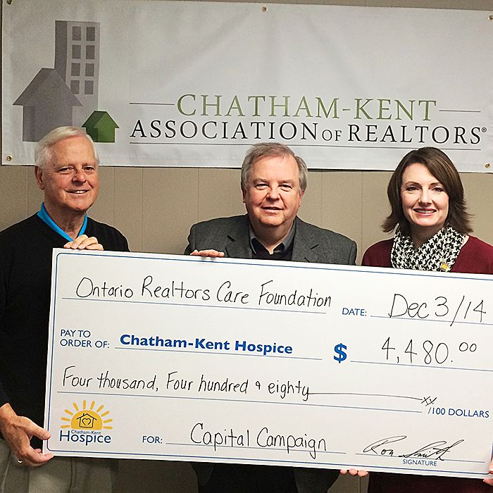 From left, John Case, chair of the hospice capital campaign; Ron Smith president of the local real estate association; and Jodi Maroney, director of development for the Chatham-Kent Hospice.
