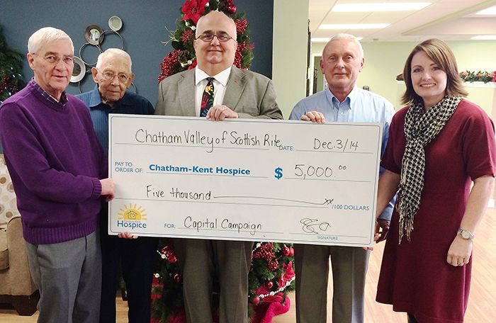 From left, Wayne O’Sullivan, Bob Waddell, Robbie McNaughton, and Willard Barnes from Chatham Valley of Scottish Rite present a cheque for $5,000 to Jodi Maroney, director of development for the Chatham-Kent Hospice.