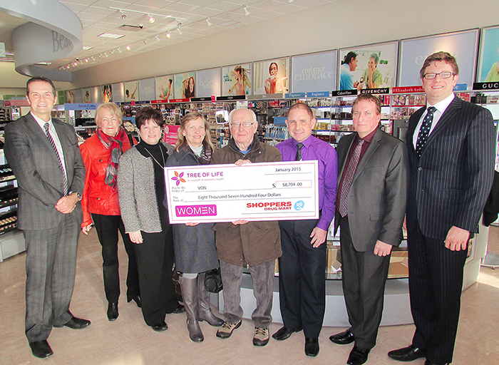 Local Shoppers Drug Marts donated $8,704 to the VON Wednesday through their Tree of Life campaign. From left, Jon Jewell, manager of business development and external relations with VON Erie St. Clair; Betty Parliament, a VON director; Erin Berry, of the Blenheim Shoppers store; Laurie Leonard, of the Queen Street Chatham Shoppers; Bob Mann, a VON director; Chris Mazaris, of the Grand Avenue and Nortown Shoppers; Terry Barris, Shoppers district manager; and Nate Lucyk, president of the Chatham-Kent VON board.
