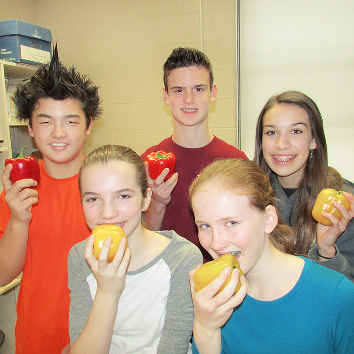 Students at Monsignor Uyen Catholic School really like the Farm to School program that delivers fresh fruit and vegetables to the school from now until the end of the year. Top row from left, Khuen-Dte Jung, Calum O’Hara and Megan Morrison. Bottom row, Danielle Gregory and Cora Vince.
