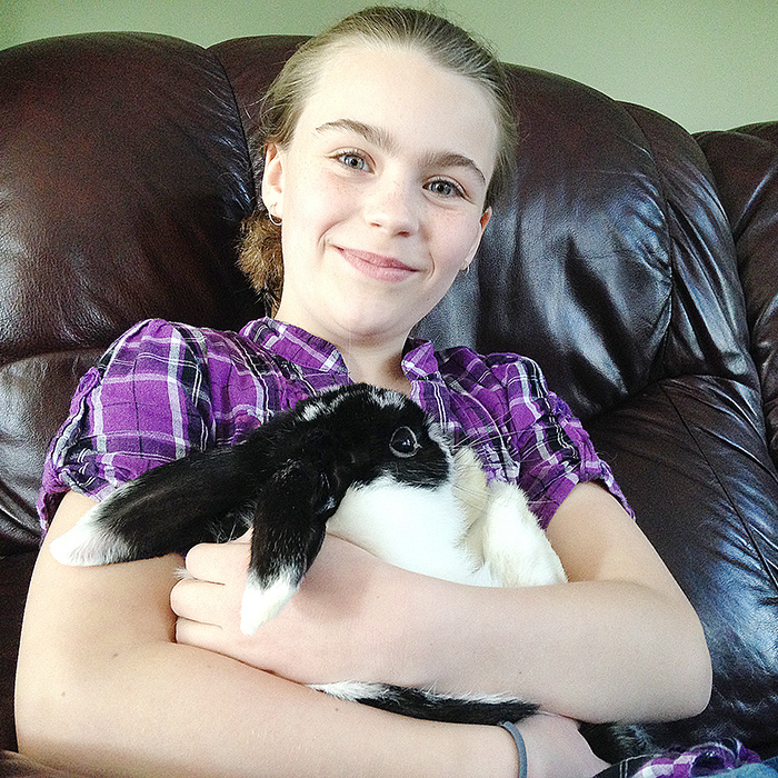 Wallaceburg's Megan Krogman, with her pet bunny, Holly.