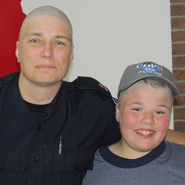 Chatham-Kent Police Const. Amy Finn, shown here with her son Dean after a cancer fundraiser in 2015, received six nominations for the 2017 Police Association of Ontario Hero of the Year award. Windsor Police Const. Celia Gagnon edged out Finn in the community hero category.