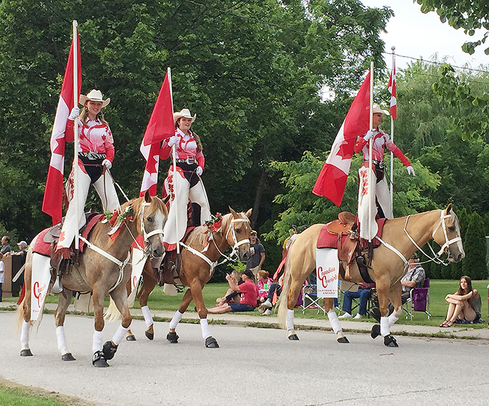 The Canadian Cowgirls take part in the 40th annual Thamesville Threshing Festival parade Friday night.