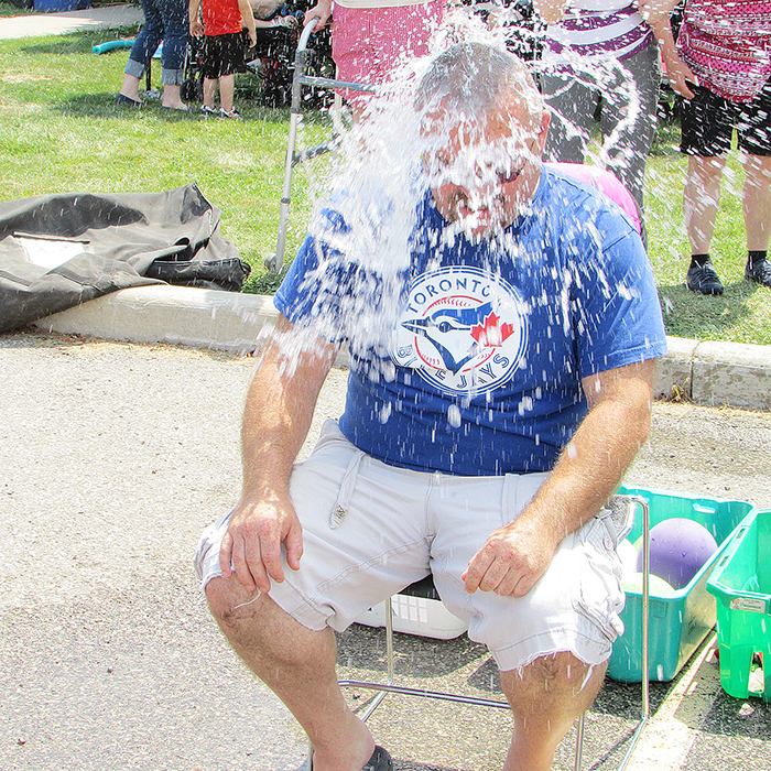 Ken Francis enjoys a nice water balloon dunking at the third annual Children’s Respite Carnival held July 29 by Community Living Chatham-Kent. The person responsible for the dunk was none other than Francis’ daughter, Lydia.