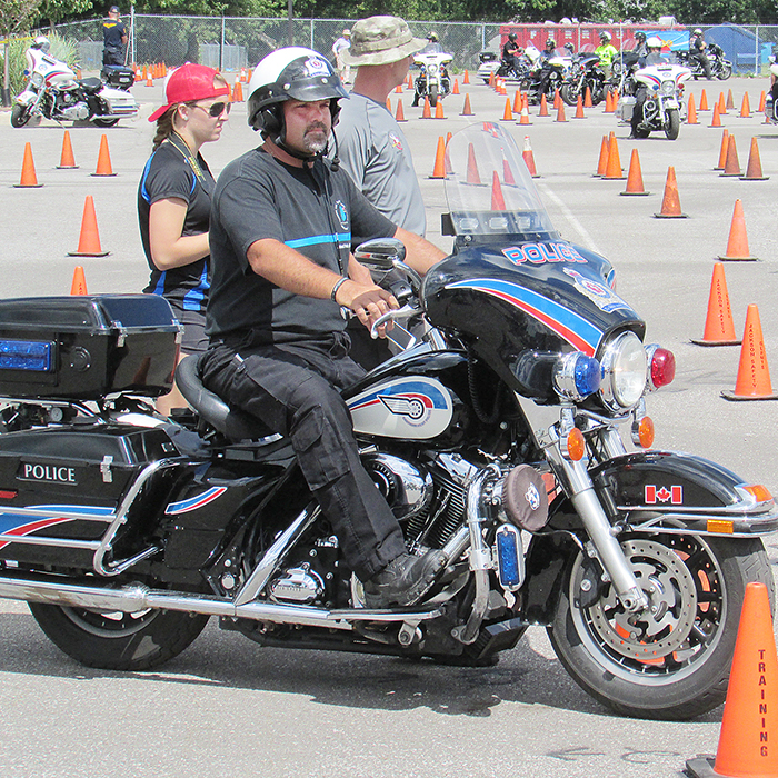 Const. Todd Trahan of the Chatham-Kent Police Service waits for his turn at the course Thursday at the Great Lakes Police Motorcycle Training Seminar in Chatham.