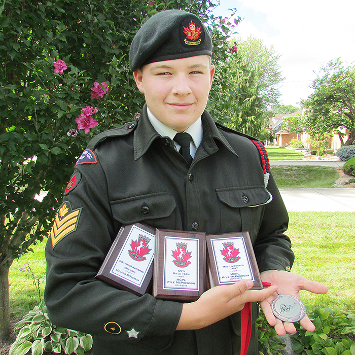 Kyle McPherson, currently a Sergeant with the 59th Legion Highlander Royal Canadian Army Cadet Corps in Chatham, stands proudly in dress uniform with the awards he has won since joining as a cadet in 2012.