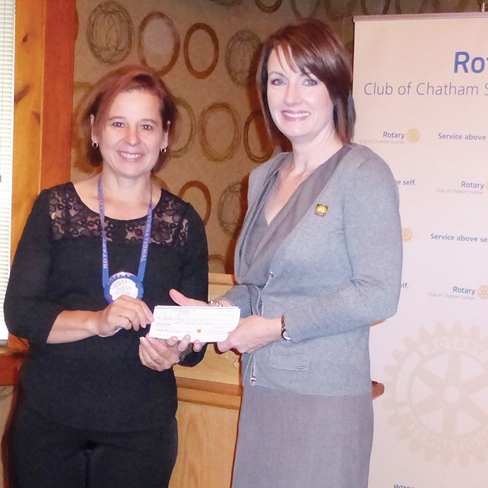 Sunrise Rotary Club of Chatham President Mary-Frances Kluka presents a cheque for $15,000 to Jodi Maroney, director of development for the Chatham-Kent Hospice.