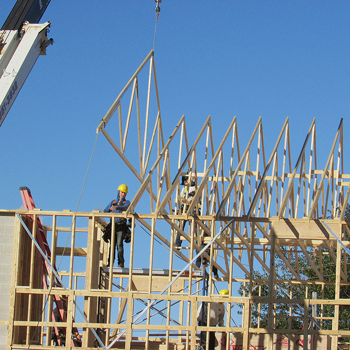 Workers were busy Saturday putting roof trusses in place for the new Blenheim and Community Senior Centre. The centre is expected to be open next spring.