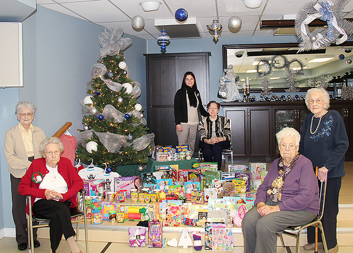 St. Andrew’s Residence collected items for the Salvation Army recently. Front, from left, Doris Cox, Jean Alexander, Clara Keenan and Virginia Jenner (residents). Back row: Melissa Parker (Community Relations and Development Manager) and Dorothy Johnston (resident).
