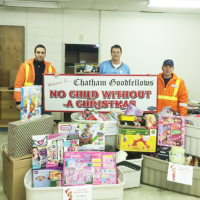 Eric Bence of Union Gas, Tim Haskell of Chatham Goodfellows and David Yakubowich of Union Gas display toys donated by Union Gas Employees.