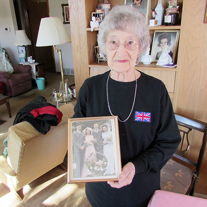 Mildred (Marg) Mills with her wedding photo.