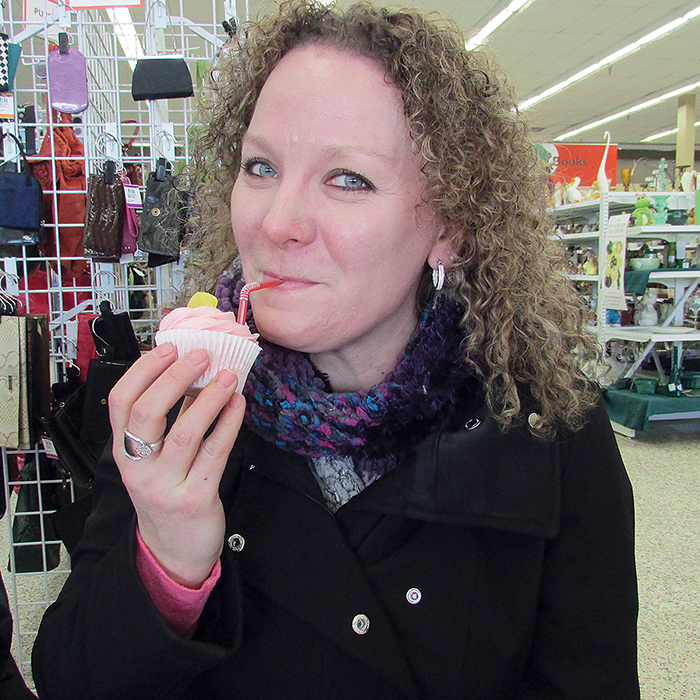 Jenn Knights of the Chatham-Kent Veterinary Hospital “sips” on a strawberry milkshake cupcake. Knights joined The Voice’s Bruce Corcoran and three other folks as judges in Saturday’s Value Village National Cupcake Day Bake-Off.