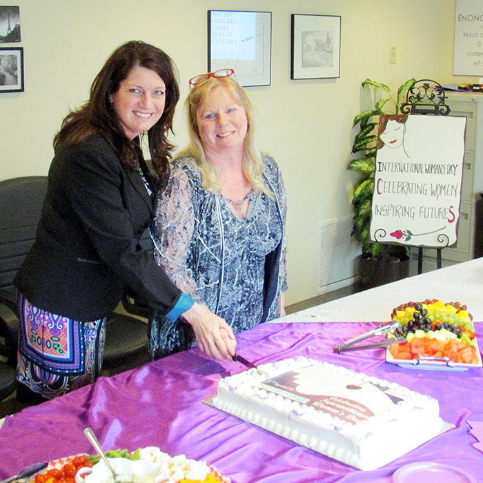 The Chatham-Kent Women’s Centre commemorated International Women’s Day last week with a ceremony and a cake, marking the CKWC’s opening on March 8, 1978. Here, board president Darlene Smith and Executive Director Karen Hunter cut the cake.