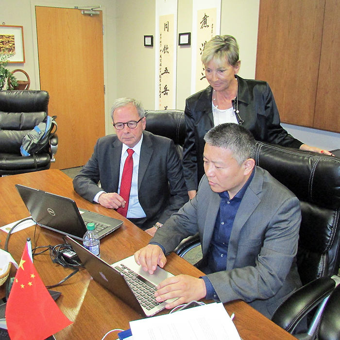 Chinese officials visited Chatham-Kent last week to examine the possibility of locating a tire recycling facility in the community. Here, Guozhong Sun, a vice-president with the firm, is seen with Economic Development Director Michael Burton and development officer Suzanne Brown.