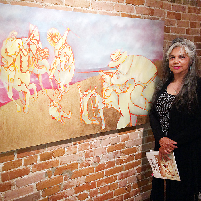 Artist Darla Fisher-Odjig showcases one of her works on display at ARTspace until June 25.