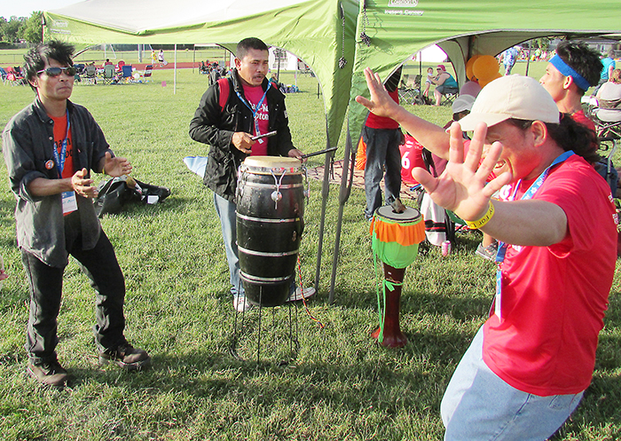 Saturday’s annual Relay for Life event was a mixture of remembrance for those claimed by cancer and celebration and hope for those still fighting against the disease. This group of Taiwanese participants brought their own unique twist to the proceedings, dancing and drumming throughout much of the event.