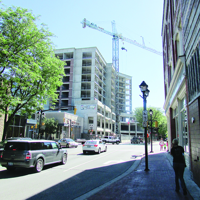 The massive crane that has towered over King Street is to be gone by tomorrow morning. The Boardwalk on the Thames condominium project will still require lane closures while the project is completed.