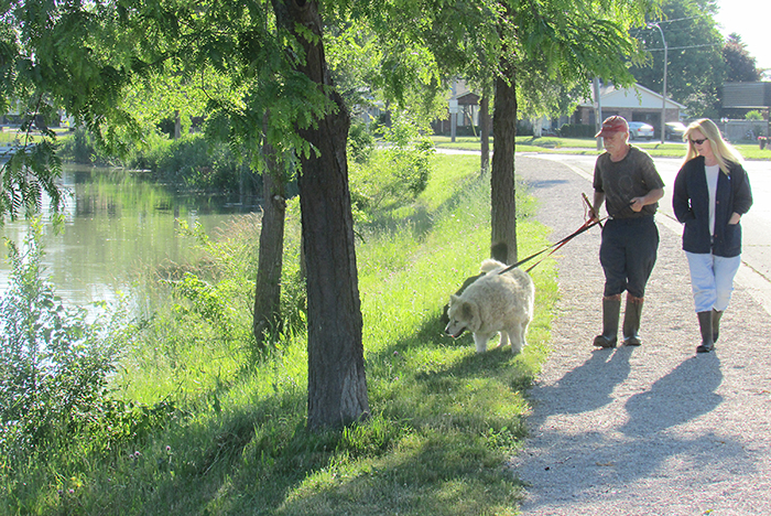 Only hours after it was opened, the Wallace Street Recreational Trail was busy with residents walking their dogs along the scenic river route. The trail paralells the east branch of the Sydenham River before linking up with the Paw Paw Woods trail near the Baxter subdivision.