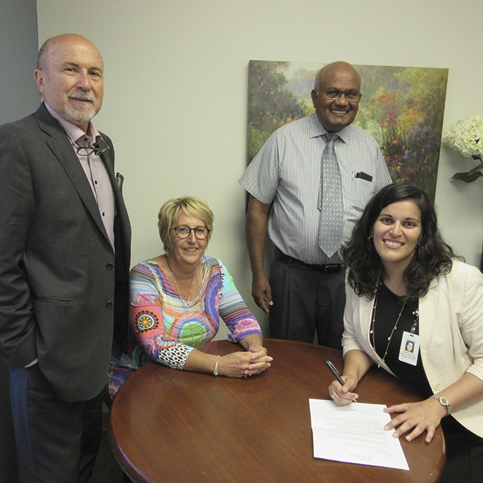 Fannie Vavoulis has joined the Foundation of the Chatham-Kent Health Alliance as its director of development. Here Fannie (right) is welcomed by Colin Patey, President & CEO, CKHA; Michele Grzebien-Huckson, Executive Director and Dr. Cassie Harnarine, chair of the foundation board of directors. 
