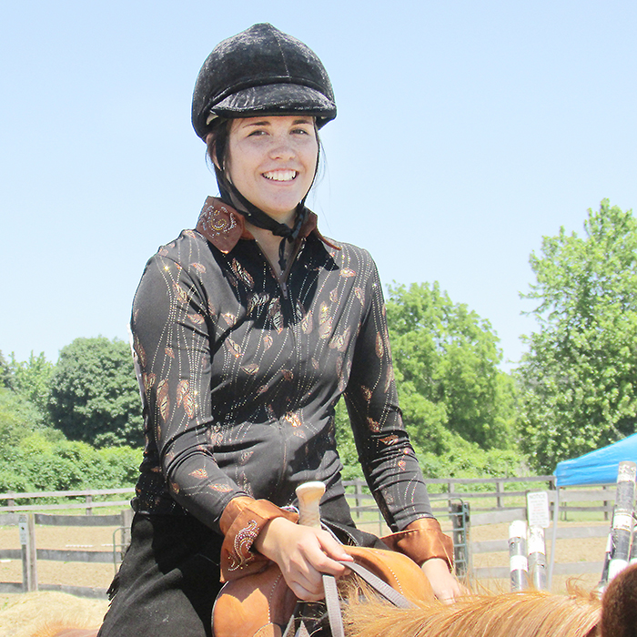 Sixteen-year-old Jayden Mallette of Wallaceburg is all smiles following her horsemanship competition on her registered paint, two-year old Colby.