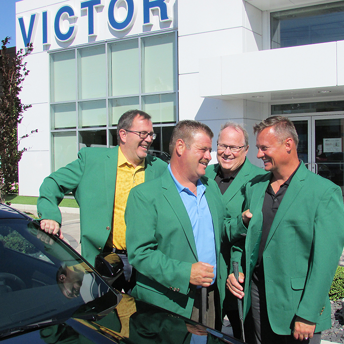 The first annual Festival of Golf will be held Friday September 16 at the Willow Ridge Golf and Country Club. Proceeds of the event will be donated to the Chatham-Kent Children’s Treatment Centre. Here golfers Darrin Canniff, Dave Matteis, Don Leonard and Michael Grail check out the winners’ green jackets while standing next to a new Ford Mustang that will be won by one golfer.