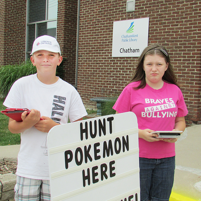 Gabriel Vanmoorsel, 11, and Kathleen Boorman, 14, were two of the dozens of kids who popped by the Chatham Library July 21 to hunt Pokemon. The library is a hot spot for capturing the little monsters in the Pokemon Go game. 
