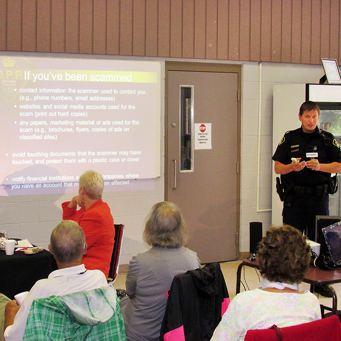 Const. Jay Denorer of the Chatham-Kent detachment of the OPP gives a presentation on how seniors can avoid scam artists who use a variety of methods to defraud victims of millions of dollars each year. The session took place at the Active Lifestyles Centre and was hosted by Chatham-Kent-Essex MPP Rick Nicholls.