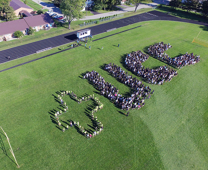 Students at the Pines spelled out UCC and a positive sign as part of Positivity Day in Chatham-Kent last week. Thousands of local students and members of the general public took part in scores of events throughout the day. Contributed photo courtesy of Wesley McDonald, Candlebox Productions