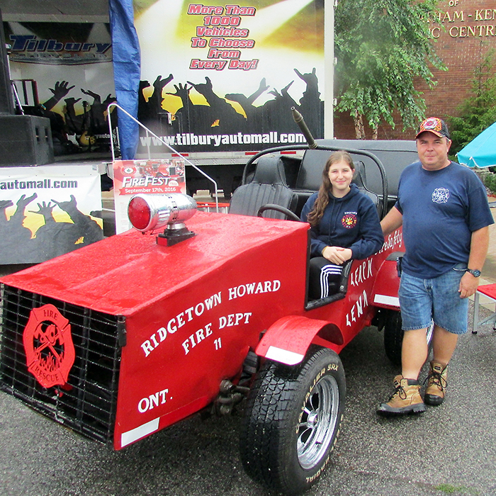 Despite the rain Saturday, Mark Evans and his daughter Jessica were on hand with Leapin’ Lena for FireFest. The Ridgetown parade vehicle has been delighting crowds for more than 40 years.