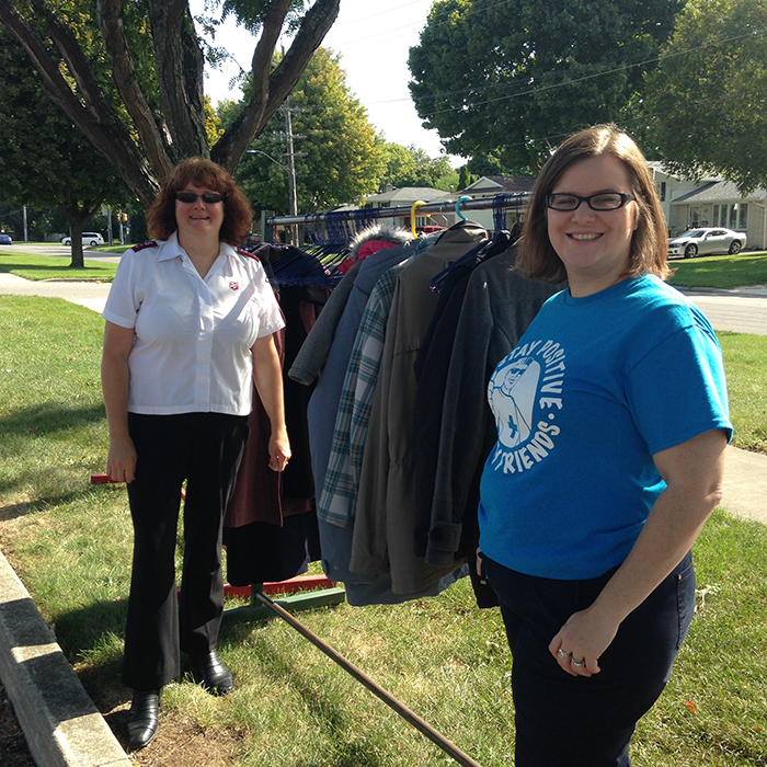 Captain Stephanie Watkinson (left) of The Salvation Army and Kate do Forno Project Co-ordinator, Prosperity Roundtable tally up the more than 45 coats donated during the recent coats for coffee event sponsored by United Way. 