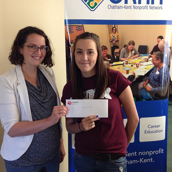 Kim Broadbent (left), Chatham-Kent Nonprofit Network Co-ordinator, awards the Josie Matteis Doto Bursary for Nonprofit Management to Emily Mailhot.